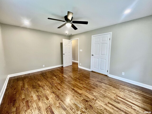 314 W 12th St, Metropolis, IL 62960 - unfurnished bedroom with wood finished floors and a ceiling fan
