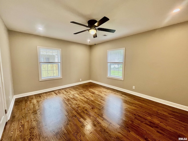 314 W 12th St, Metropolis, IL 62960 - spare room featuring dark wood finished floors, a ceiling fan, and recessed lighting