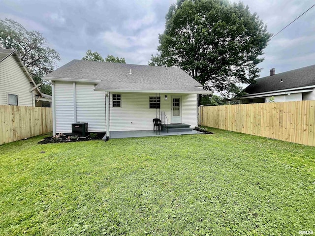 314 W 12th St, Metropolis, IL 62960 - rear view of house featuring a patio area and a fenced backyard
