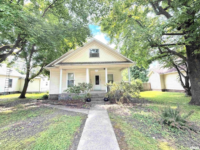 306 E 5th St, West Frankfort, IL 62896 - bungalow-style home featuring a porch