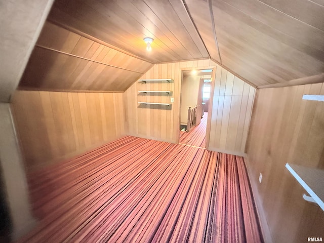 306 E 5th St, West Frankfort, IL 62896 - additional living space featuring wood walls, lofted ceiling, wood ceiling, and carpet floors