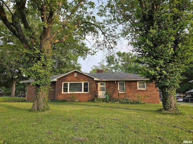 832 Fairfield Rd, Mount Vernon, IL 62864 - ranch-style house with brick siding, a front lawn, and a chimney