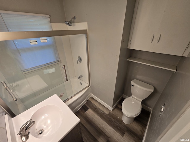 832 Fairfield Rd, Mount Vernon, IL 62864 - bathroom featuring wood finished floors, bath / shower combo with glass door, and vanity