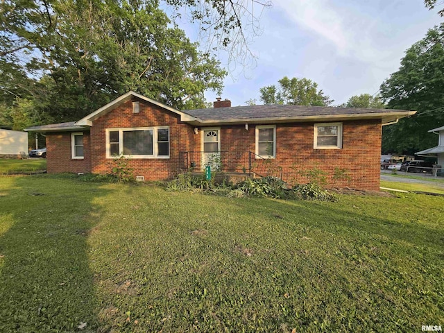 832 Fairfield Rd, Mount Vernon, IL 62864 - single story home featuring brick siding, a front lawn, and a chimney