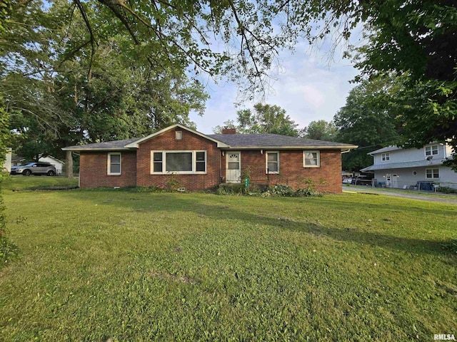 832 Fairfield Rd, Mount Vernon, IL 62864 - ranch-style house featuring brick siding, a front yard, and a chimney