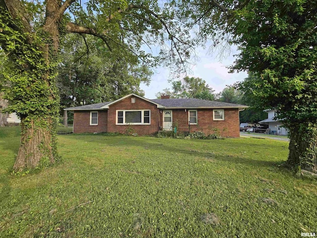 832 Fairfield Rd, Mount Vernon, IL 62864 - ranch-style home featuring brick siding, a front yard, and a chimney