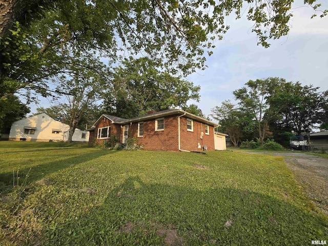 832 Fairfield Rd, Mount Vernon, IL 62864 - ranch-style house featuring a front yard, brick siding, and a chimney