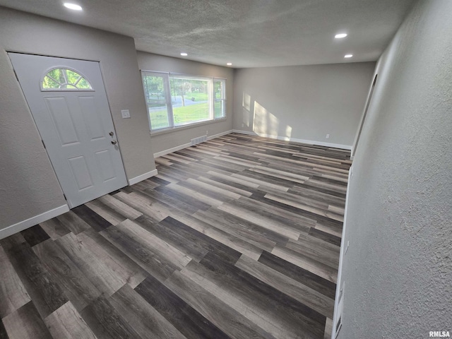 832 Fairfield Rd, Mount Vernon, IL 62864 - foyer entrance with a textured wall, recessed lighting, wood finished floors, and a textured ceiling
