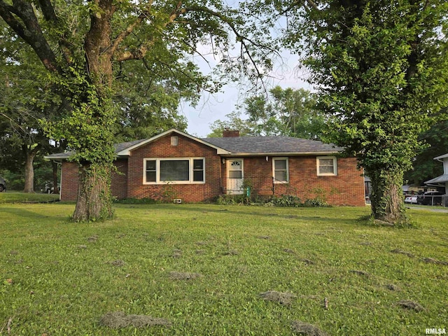 832 Fairfield Rd, Mount Vernon, IL 62864 - ranch-style house featuring brick siding, a front lawn, and a chimney