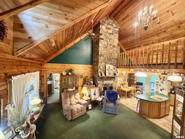 9596 Fox Hunters Rd, Benton, IL 62812 - carpeted living room with wooden walls, ceiling fan, wooden ceiling, high vaulted ceiling, and a chandelier