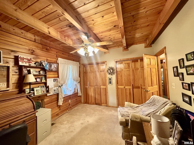 9596 Fox Hunters Rd, Benton, IL 62812 - sitting room featuring light carpet, a wooden ceiling with exposed beams, ceiling fan, and wooden walls