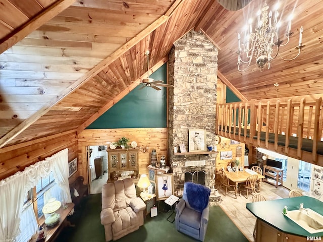 9596 Fox Hunters Rd, Benton, IL 62812 - living area featuring wooden ceiling, wooden walls, a chandelier, high vaulted ceiling, and ceiling fan