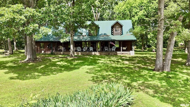 9596 Fox Hunters Rd, Benton, IL 62812 - view of front of property featuring a front lawn, covered porch, and a metal roof