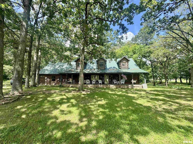 9596 Fox Hunters Rd, Benton, IL 62812 - view of front of home with covered porch, a front yard, and a metal roof