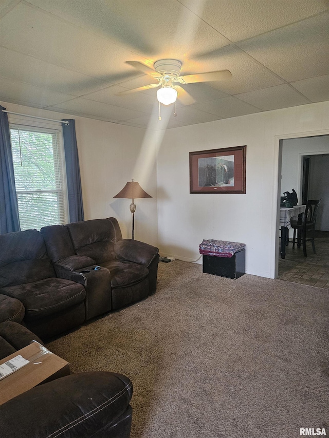 123 W College St, Harrisburg, IL 62946 - carpeted living room featuring a ceiling fan