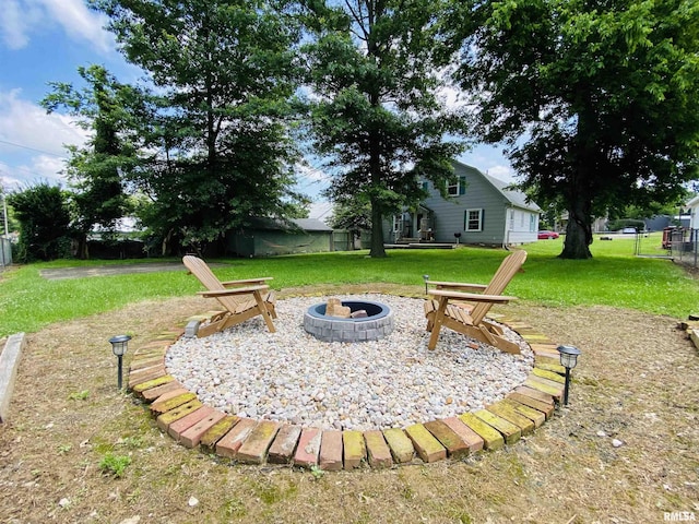 245 W Mcclernand Ave, Shawneetown, IL 62984 - view of green lawn with a fire pit