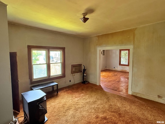 104 E 5th St, Brookport, IL 62910 - carpeted spare room featuring a wall unit AC and baseboards