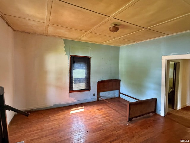 104 E 5th St, Brookport, IL 62910 - spare room featuring wood finished floors and baseboards