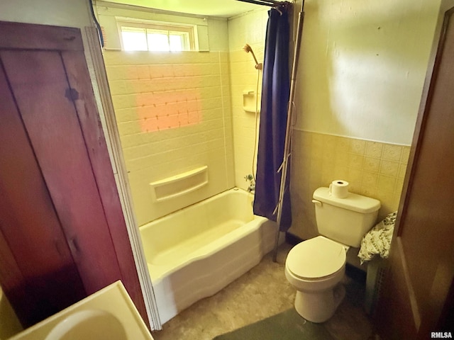 104 E 5th St, Brookport, IL 62910 - bathroom with shower / tub combo, tile walls, and wainscoting