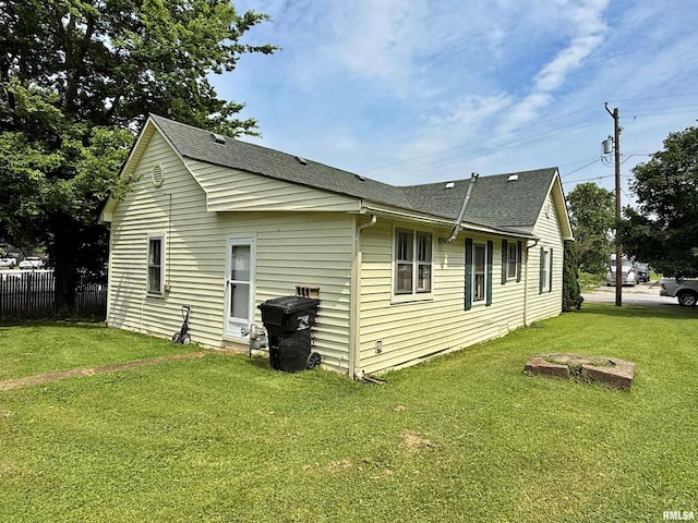 104 E 5th St, Brookport, IL 62910 - view of property exterior featuring roof with shingles