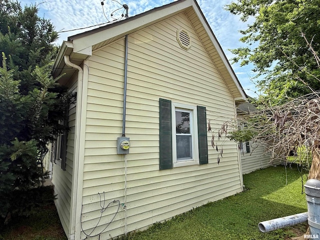 104 E 5th St, Brookport, IL 62910 - view of side of home featuring a lawn