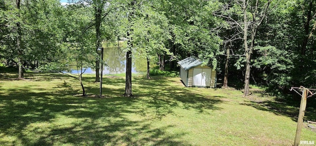 45 Donetta Ln, Creal Springs, IL 62922 - view of grassy yard featuring a shed and a water view