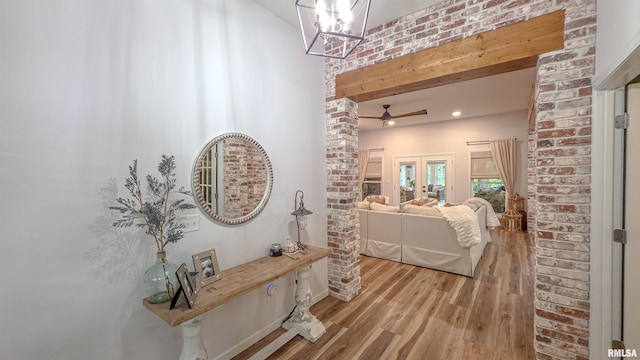 2940 Parrish Rdg, Goreville, IL 62939 - hall with wood finished floors, french doors, and brick wall