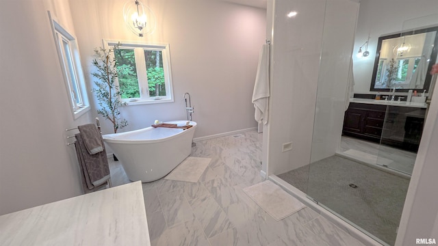 2940 Parrish Rdg, Goreville, IL 62939 - full bathroom featuring marble finish flooring, a freestanding tub, vanity, and walk in shower