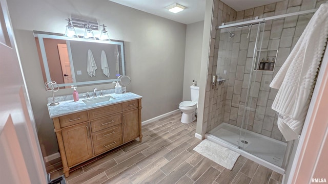 2940 Parrish Rdg, Goreville, IL 62939 - bathroom featuring vanity, wood finish floors, and a stall shower