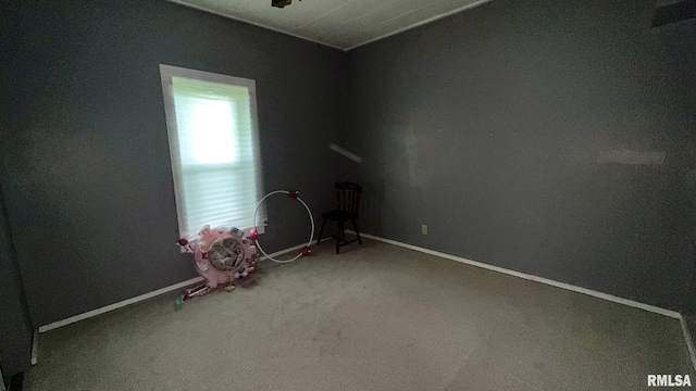 404 E Main St, Buckner, IL 62812 - carpeted empty room featuring baseboards