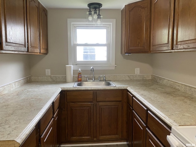 211 Charles St, Benton, IL 62812 - kitchen featuring light countertops and stove