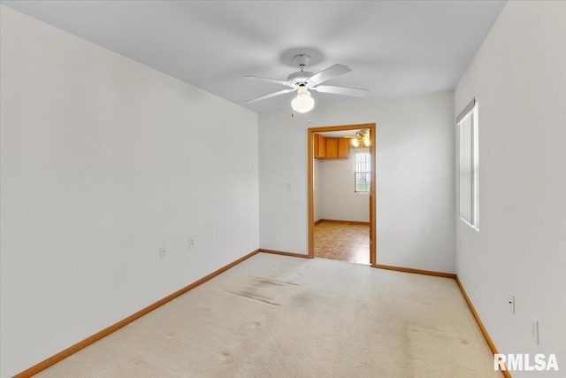 1504 Apache Dr, Marion, IL 62959 - empty room with ceiling fan and light colored carpet
