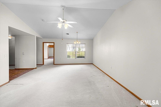 1504 Apache Dr, Marion, IL 62959 - carpeted spare room featuring vaulted ceiling, a ceiling fan, and a chandelier