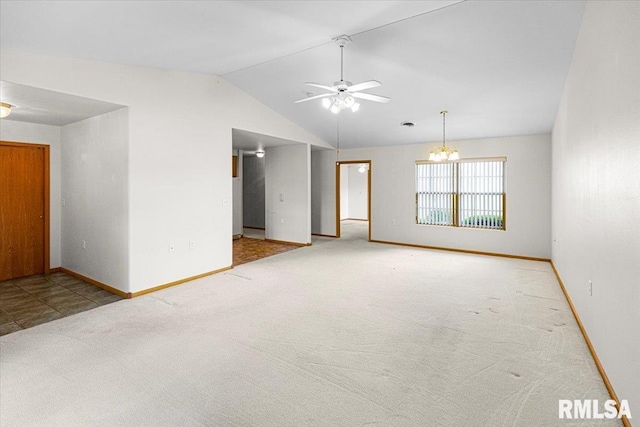 1504 Apache Dr, Marion, IL 62959 - spare room with lofted ceiling, carpet floors, ceiling fan, and a chandelier
