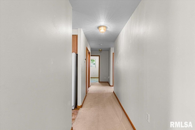 1504 Apache Dr, Marion, IL 62959 - corridor featuring baseboards and light carpet