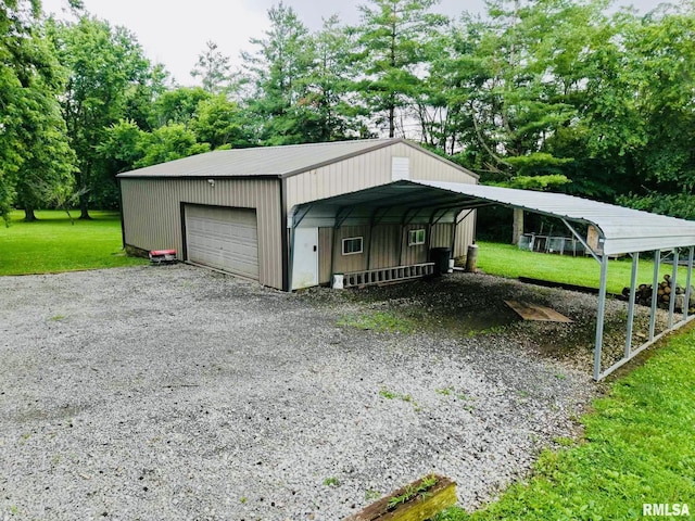 2209 Cedar Hill Rd, West Frankfort, IL 62896 - detached garage with view of wooded area