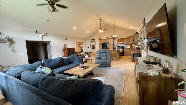 2209 Cedar Hill Rd, West Frankfort, IL 62896 - living area with ceiling fan, light wood-type flooring, and high vaulted ceiling