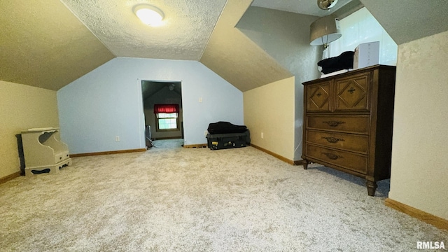 2209 Cedar Hill Rd, West Frankfort, IL 62896 - bonus room with light colored carpet, vaulted ceiling, and a textured ceiling