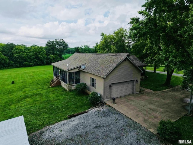 2209 Cedar Hill Rd, West Frankfort, IL 62896 - view of front of home featuring concrete driveway, a garage, a front yard, and roof with shingles