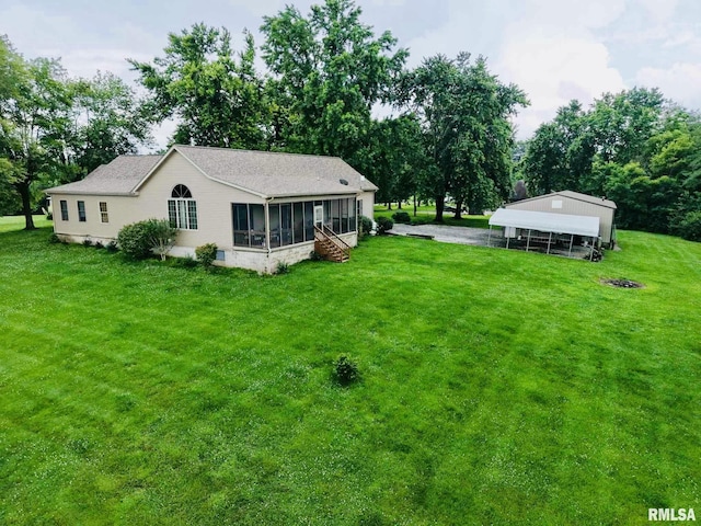 2209 Cedar Hill Rd, West Frankfort, IL 62896 - view of green lawn with a sunroom