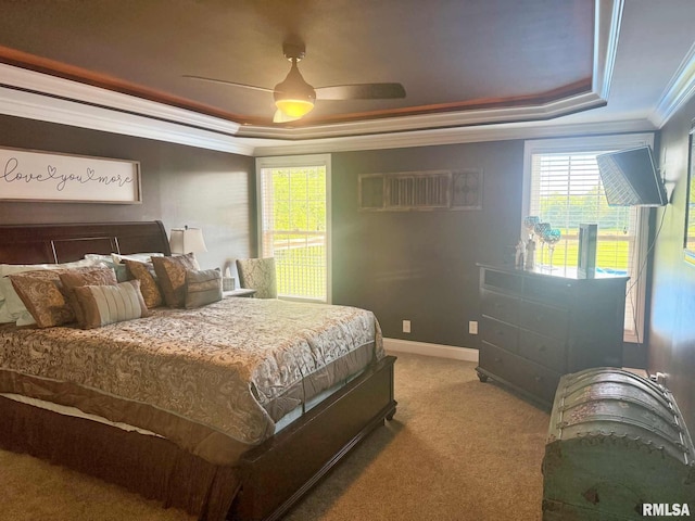 5024 Rosebud Rd, Metropolis, IL 62960 - bedroom featuring ornamental molding, a raised ceiling, light carpet, and ceiling fan
