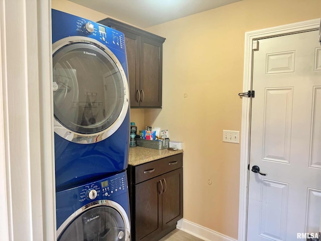 5024 Rosebud Rd, Metropolis, IL 62960 - washroom with cabinet space and stacked washing machine and dryer
