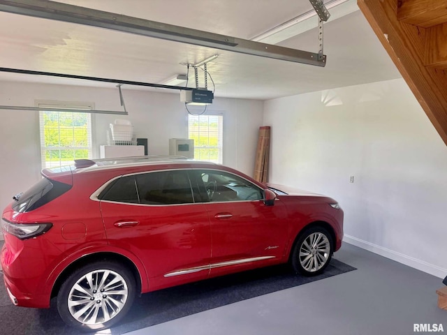 5024 Rosebud Rd, Metropolis, IL 62960 - garage with a garage door opener and electric panel