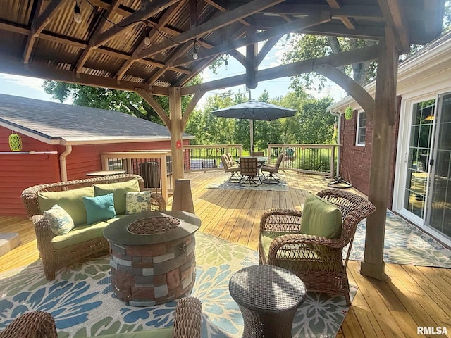 5024 Rosebud Rd, Metropolis, IL 62960 - wooden terrace featuring a gazebo, outdoor dining area, and an outdoor living space with a fire pit