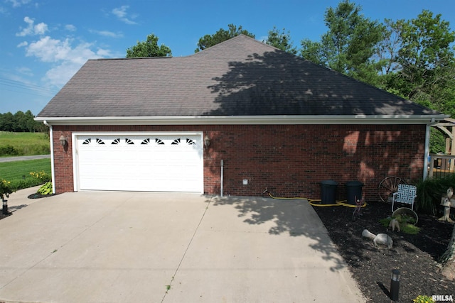 5024 Rosebud Rd, Metropolis, IL 62960 - garage with concrete driveway