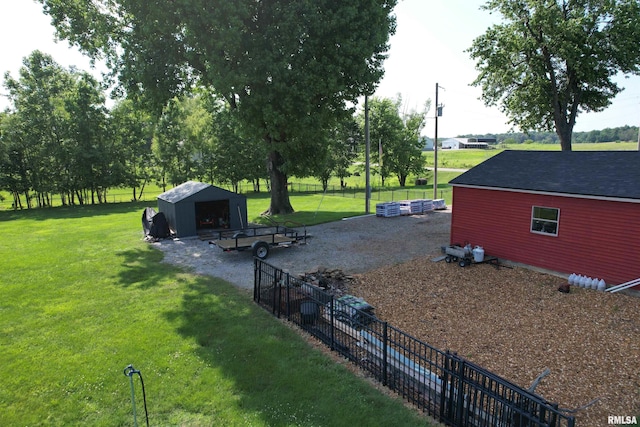 5024 Rosebud Rd, Metropolis, IL 62960 - view of yard featuring an outbuilding and a detached garage