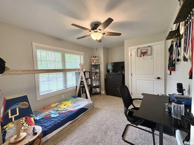 408 Madison St, Cambria, IL 62915 - bedroom with light colored carpet, an office area, and ceiling fan