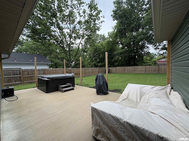 408 Madison St, Cambria, IL 62915 - fenced backyard featuring a hot tub and a patio
