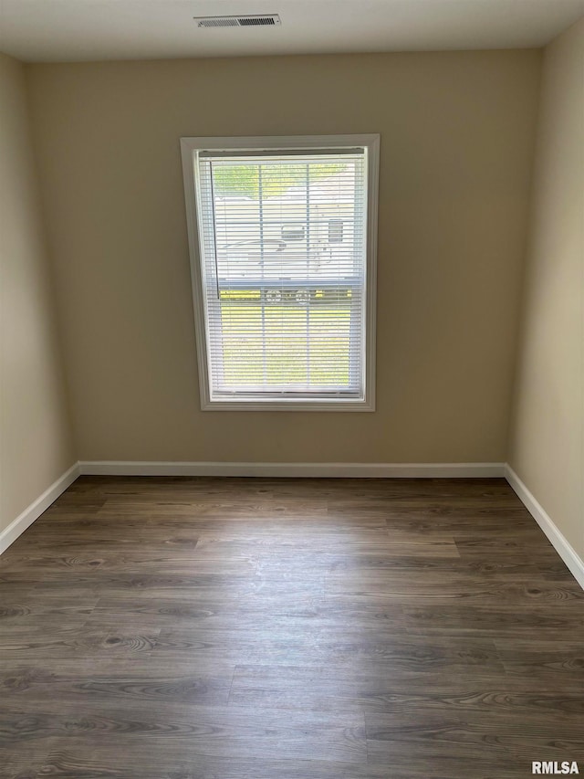 111 Bevard St, Carterville, IL 62918 - bathroom with vanity, shower / bath combo with shower curtain, and wood finished floors