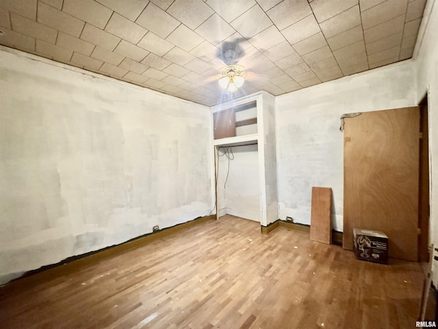 809 Highland St, Benton, IL 62812 - unfurnished bedroom with wood finished floors and a ceiling fan